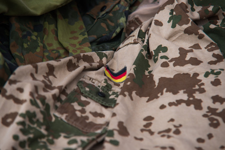 Close up on German flag on military uniformの写真素材