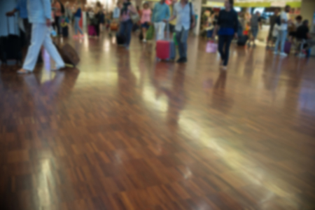 blurred people on the airportの写真素材