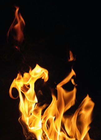 Fire flames on black background or textureの写真素材