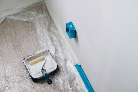 close up on brush with white pain, home repair, wall paintingの写真素材