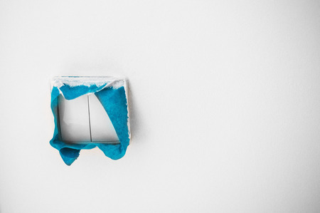 close up on blue tape, home repair, wall paintingの写真素材
