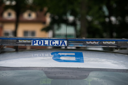 Close up on police (policja) sign on the carの写真素材
