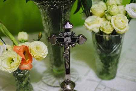 Close up on Jesus Christ Cross in Catholic homeの写真素材