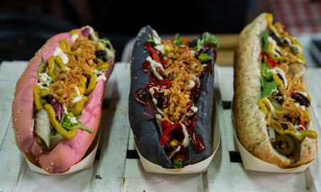 close up on three type of vegan hot dogs