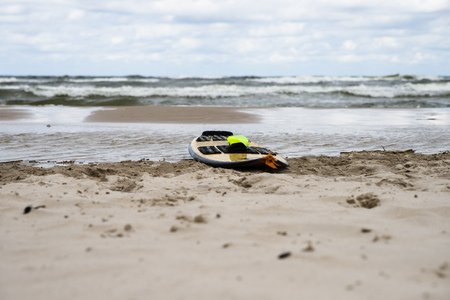 close up on kitesurfing board on the beachの写真素材