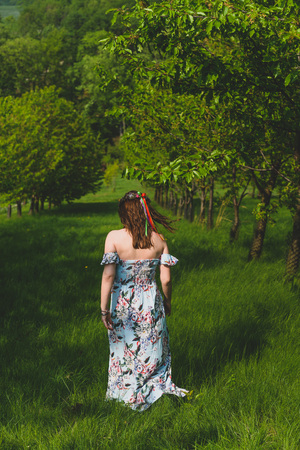 Slavic woman in a fruit gardenの写真素材