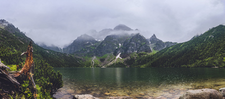 View on Tatra mountains from Morskie Oko, Poland, heavy fogの写真素材