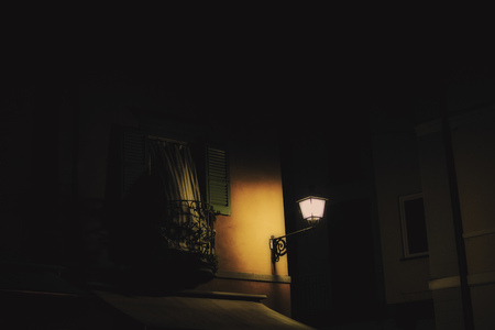 open windows at nightの写真素材