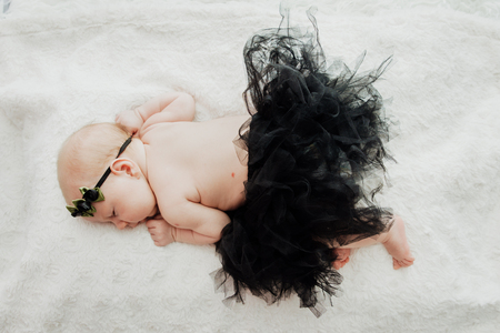 close up on newborn baby girl, top viewの写真素材