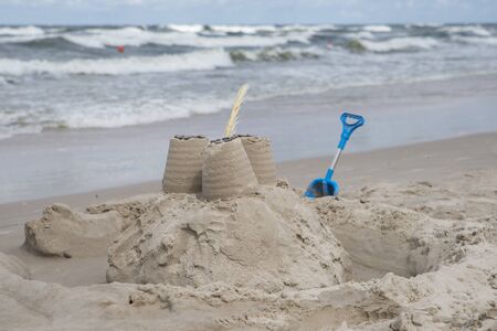 close up on sand castle on the beachの写真素材