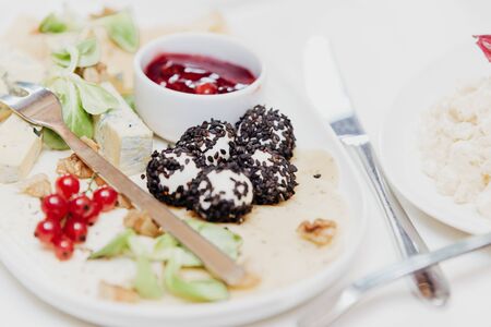 plate with various types of cheese,の写真素材