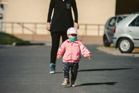 mother and baby with mask, coronavirus epidemicの写真素材