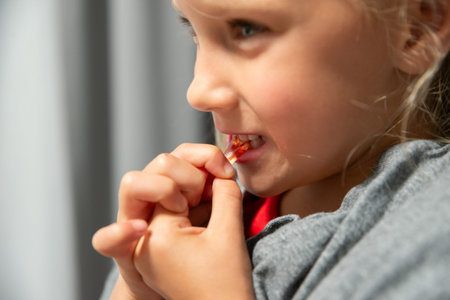 the girl is eating jelly