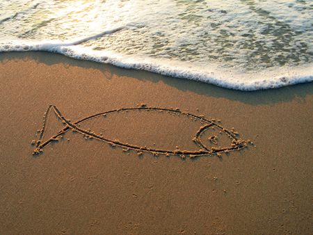 Figure on sandの写真素材