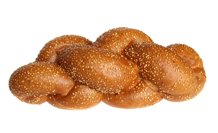 Braided white bread, sprinkled with sesame seeds, isolated on white backgroundの写真素材