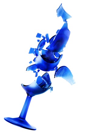 shards of a broken blue wine glassの写真素材