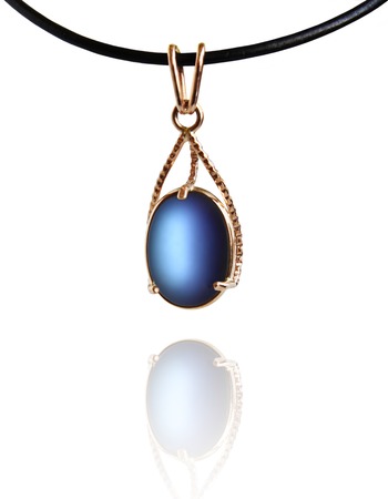 Women's gold pendant  with inset quartzの写真素材