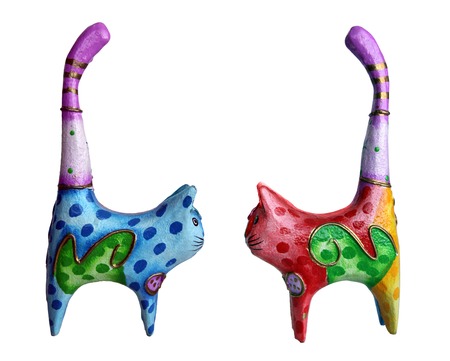 two cat figurines isolated on whiteの写真素材