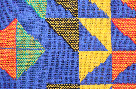 fragment homespun carpet with colorful geometric pattern