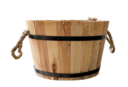 Wooden tub with rope handles isolated on whiteの写真素材