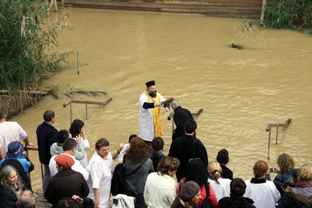 JORDAN RIVER, ISRAEL - DECEMBER 14, 2014: The baptism in the Jordan River for the Orthodox traditionのeditorial素材