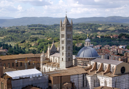 SIENA, ITALY - OCTOBER 12, 2013: Top view of the Cathedral of Siena from the bell tower Torre del Mangiaのeditorial素材