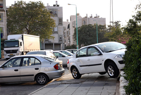 BEER SHEVA, ISRAEL - NOVEMBER 27, 2011:  Car mistakenly drove onto the sidewalk and struck the fenceのeditorial素材