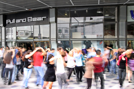 BEER SHEVA, ISRAEL - DECEMBER 10, 2010: Youth dance flash mob in a shopping center. It is taken with slow shutter speedのeditorial素材