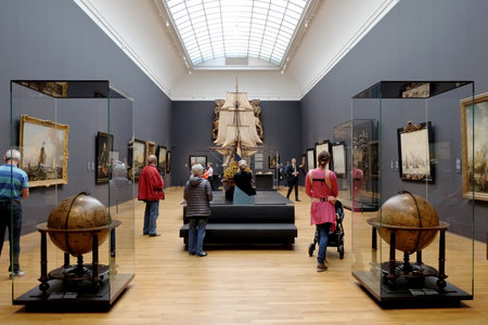 AMSTERDAM, NETHERLANDS - MAY 15, 2017: Visitors inspecting the exposition in the Rijksmuseumのeditorial素材