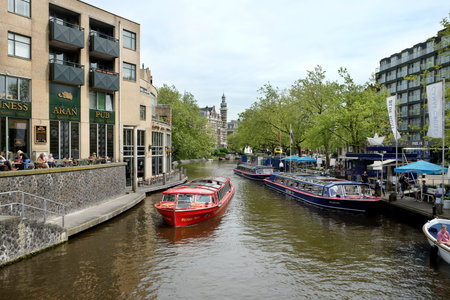 AMSTERDAM, NETHERLANDS - MAY 13, 2017: View of the Blue Boat Canal Cruises stationのeditorial素材