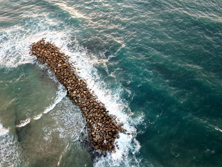 ASHKELON, ISRAEL - DECEMBER 09, 2017: View from above on the breakwater opposite the beach in Ashkelonのeditorial素材