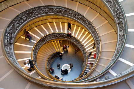 VATICAN,  VATICAN - DECEMBER 29, 2017: Spiral staircase, created in 1932 by Giuseppe Momo in the Vatican Museumsのeditorial素材