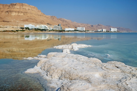 Hotels and patterns from salt on the Dead Sea resorts in Ein Bokekの写真素材