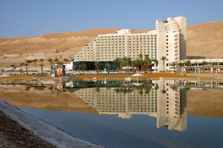 Hotels and reflections in the  morning on the Dead Sea resorts in Ein Bokekのeditorial素材