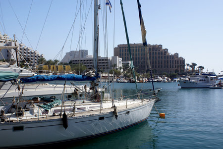 EILAT, ISRAEL - NOVEMBER 27, 2008: Yachts in the marina of Eilat on the background of hotels
