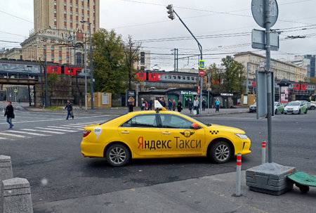 MOSCOW, RUSSIA - OCTOBER 17, 2017: Yellow Yandex taxi car is on the streetのeditorial素材