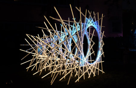 BEER SHEVA, ISRAEL - AUGUST 08, 2018: Festival of Light in Beer Sheva 2018. Geometrical figure made up of wooden slatsのeditorial素材