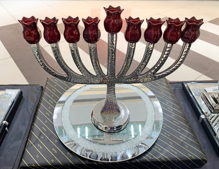 BEER SHEVA, ISRAEL - DECEMBER 18, 2019: Hanukkah candlestick for nine candles used during the Jewish holiday of Hanukkahのeditorial素材