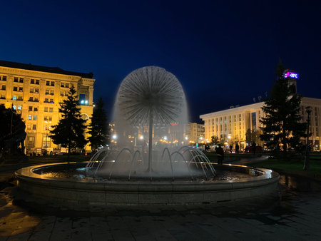 KIEV, UKRAINE - SEPTEMBER 30, 2019: Kulbaba fountain in the center of Kiev in the eveningのeditorial素材