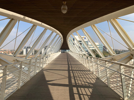 BEER SHEVA, ISRAEL - DECEMBER 22, 2020: Footbridge in the new High-Tech Park in Beer Sheva. Architectural style of high-techのeditorial素材