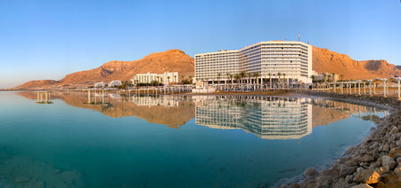 EIN BOKEK, ISRAEL - APRIL 27, 2021: Hotels in the Ein Bokek oasis at the Dead Sea at sunriseのeditorial素材