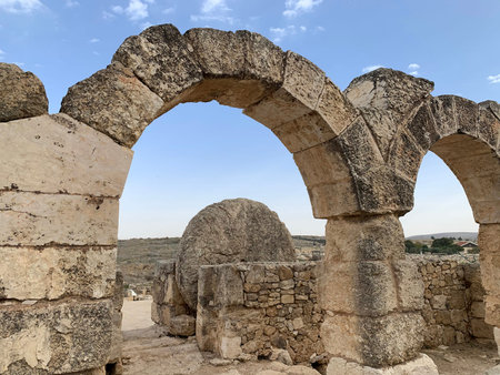 Round stone that locks the gate to the courtyard of the synagogue of the ancient Jewish settlement...
