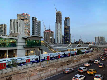 TEL-AVIV, ISRAEL - APRIL 26, 2022: View of the Ayalon highway and the railway station Tel Aviv Savidorのeditorial素材