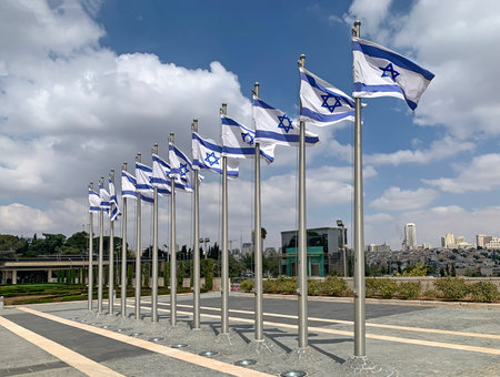 JERUSALEM, ISRAEL - SEPTEMBER 19, 2022: Israeli flags in the courtyard of the Knesset in Jerusalemのeditorial素材