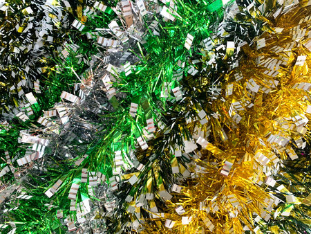 Christmas background of the multi-colored sparkling tinsel
