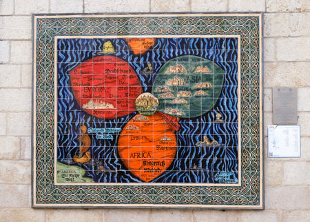 JERUSALEM, ISRAEL - OCTOBER 04, 2019: Depiction of a 15th century Map with Jerusalem at the center of the world on a wall next to the municipalityのeditorial素材