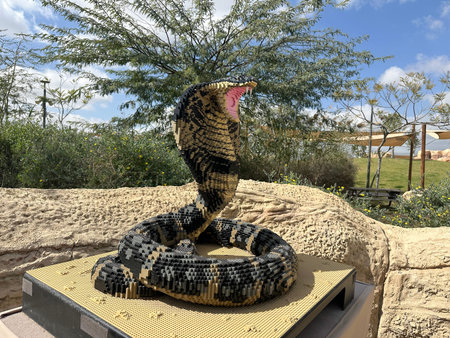 BEER SHEVA, ISRAEL - FEBRUARY 22, 2026: A cobra figure made from Lego pieces in the Midbarium...
