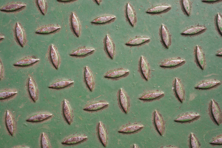 Close-up of a green painted metal floorの写真素材