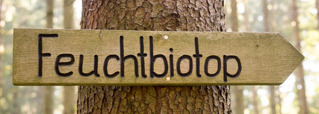 German sign "Feuchtbiotop" (translation: humid biotope)の写真素材