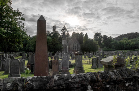New Logie Kirk and graveyard with eerie sky, near Blairlogie, Scotlandのeditorial素材